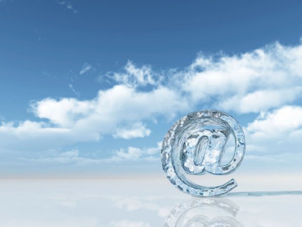 email "at" in sky surrounded by clouds