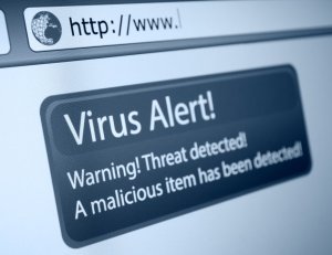 a gray browser alert that reads "virus alert! warning! threat detected! a malicious item has been detected!"